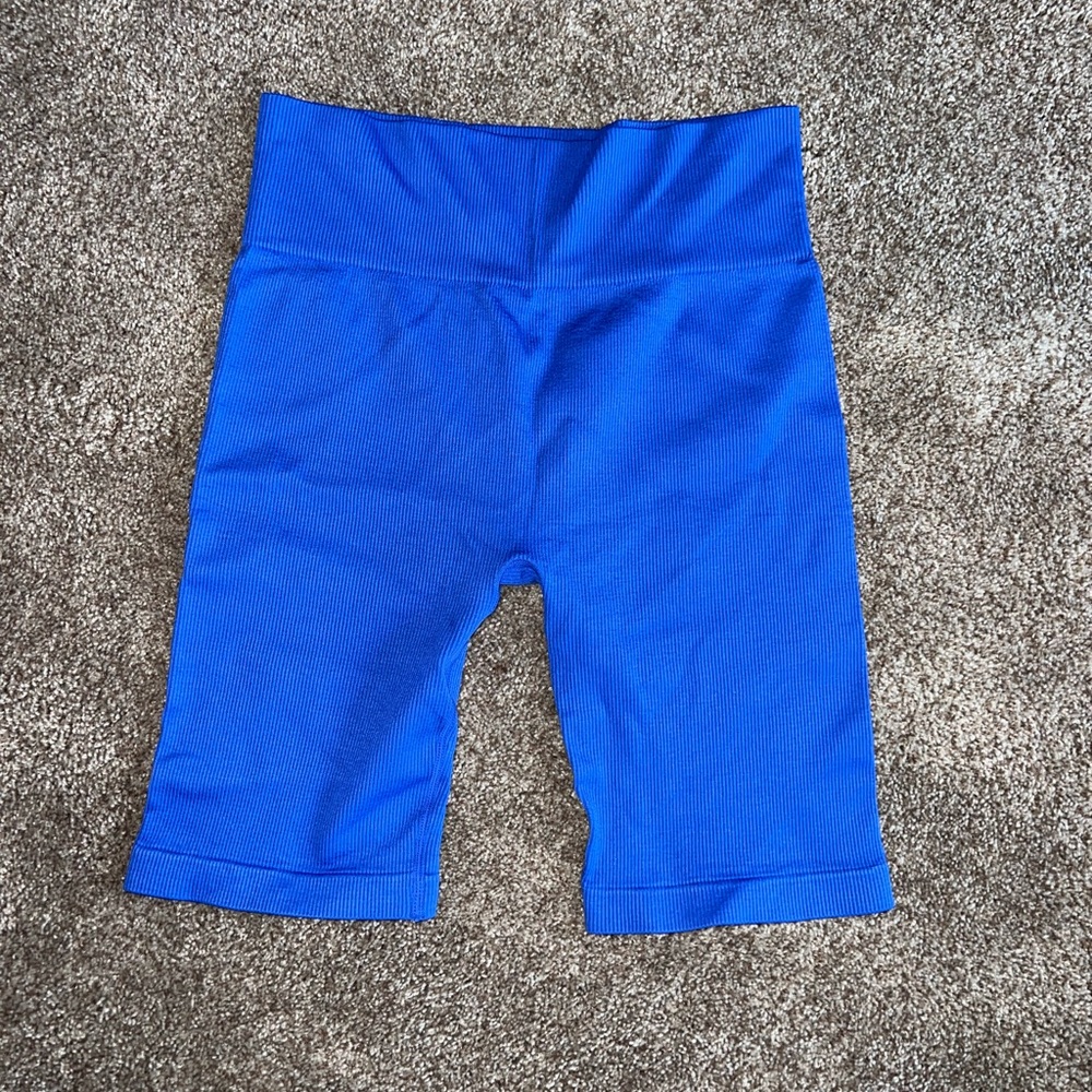 Royal blue knee length biker shorts. Size large.